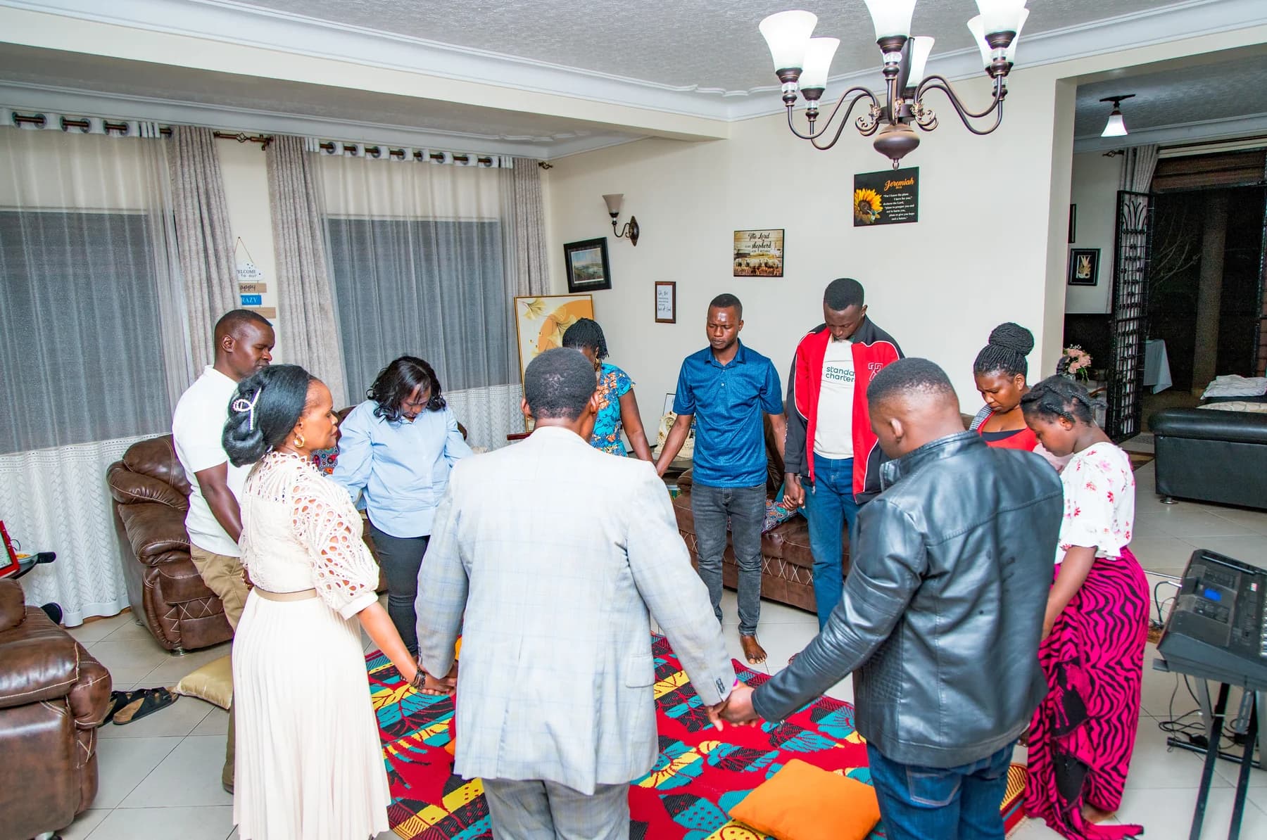 DDPIM family praying together